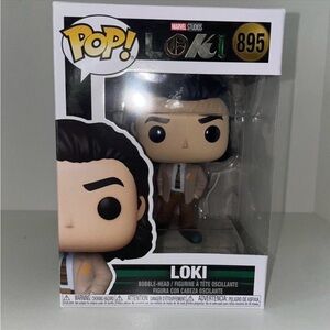 Funko Pop Loki Figure with Black Hair and Brown Suit